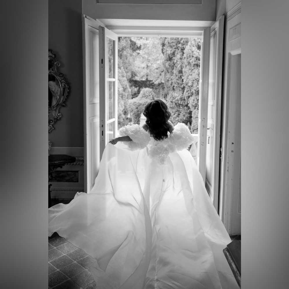 Elegant White Cape with Floral Details